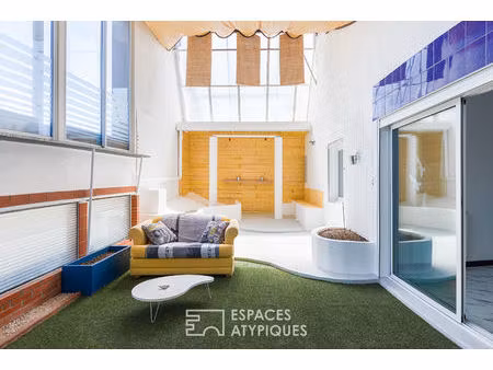 loft de style industriel et son atrium lumineux