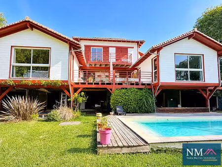 ensemble immobilier rare au coeur de la nature . deux maisons ossature bois