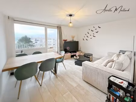 appartement de 62.60 m² - 2 chambres - un balcon - un parking - une cave