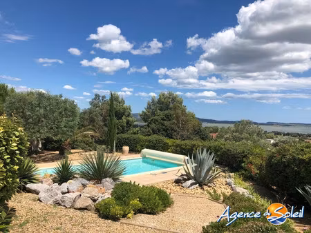 villa d'exception avec piscine et vue imprenable sur étang
