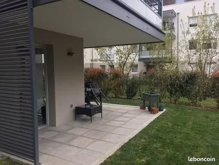 appartement 3 pièces 63 m2  cave  garage et jardin