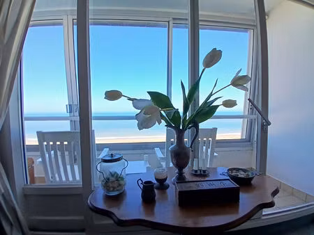 front mer_ appartement de 4 pieces_ 75m2_ 2 chambres_ parkings_courseulles -sur-mer