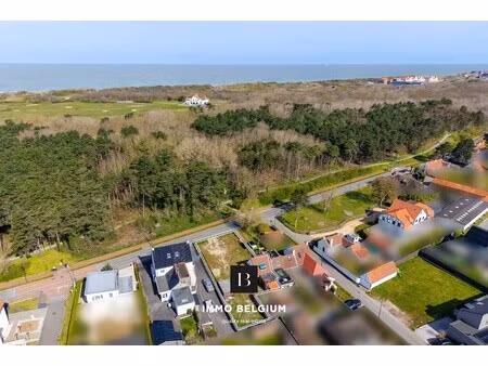 af te werken woning tegenover het bos