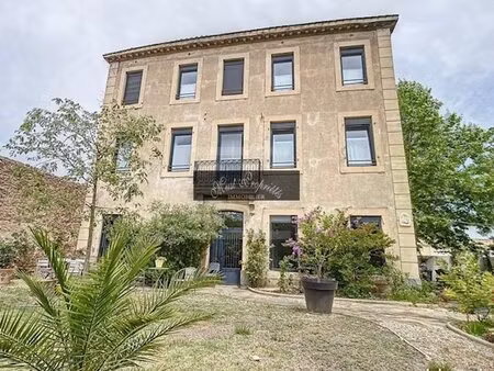 maison de 450 m2 avec 4 logements.