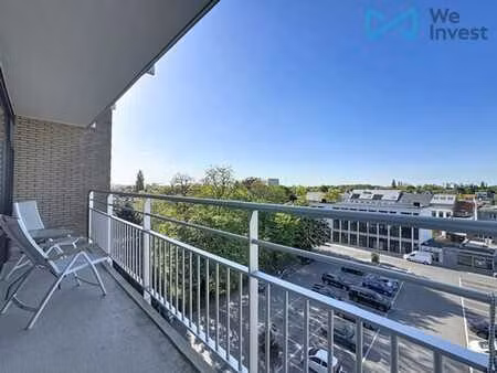 app. met 2 slpk  2 terrassen  ruime kelder én garagebox