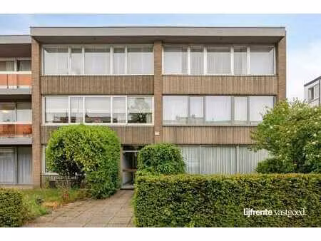 gelijkvloers appartement met 3 slpks  tuin en garagebox