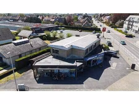 ruim handelspand met woonst op commerciële toplocatie. o...