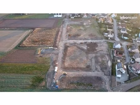 terrain 568 m² houssen