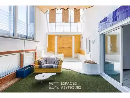 loft de style industriel et son atrium lumineux
