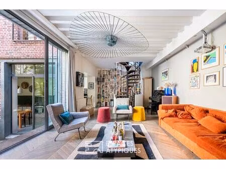 maison à l'esprit loft avec terrasse