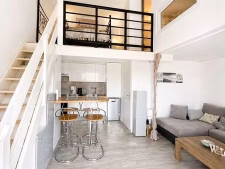 t2 atypique meublé avec mezzanine et coins nuits