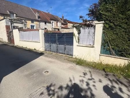 vente terrain + garage