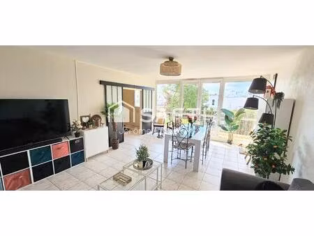 secteur gare : appartement de 98m² avec 3 chambres  balcon  cave et garage.