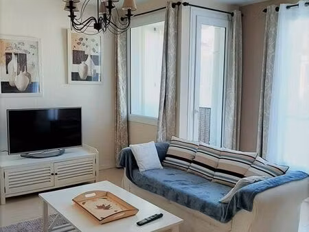 appartement 63 m2 avec balcon en coeur de ville à 100 m de la plage de royan