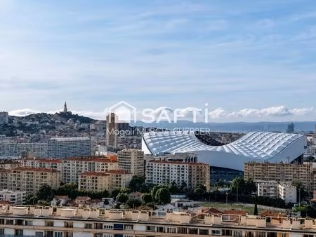 t4 d’exception avec vue sur les toits de la ville