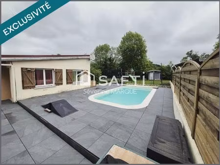maison de village avec garage  jardin et piscine.