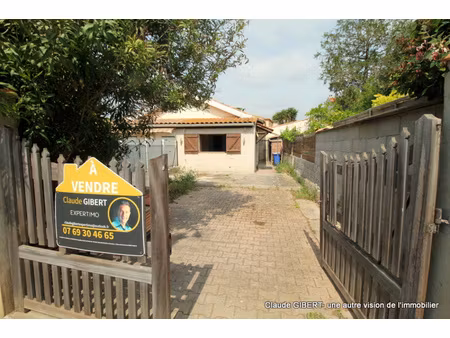 maison/appartement de plain-pied en coproprièté avec jardin privatif et stationnement