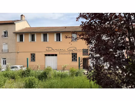 maison de ville avec grand garage et terrain