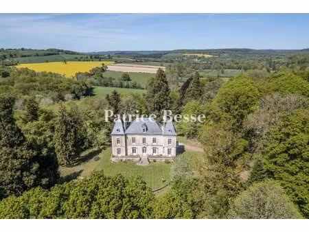 dans la forêt domaniale d'écouves  au nord de l'orne  un château du 19e s. à restaurer ...
