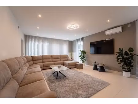 ruim handelshuis met woonst te spalbeek (hasselt)