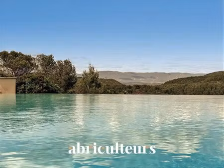 magnifique villa de 296 m² avec piscine  terrain de 1 2 ha et vue exceptionnelle à rognes.
