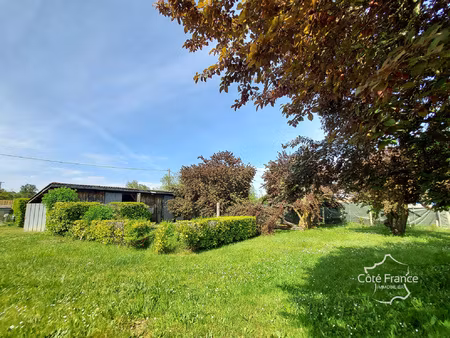 terrain viabilisé avec hangar de 80 m2 au calme et sans vis-