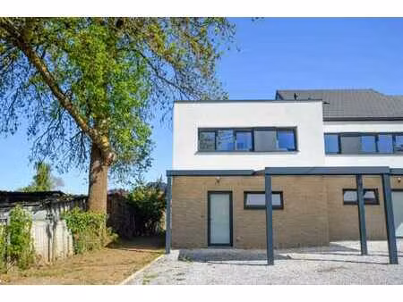 delfimmo - superbe maison neuve 3 facades avec carpot !