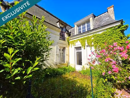 maison de village avec double garage  dépendances et terrain arboré