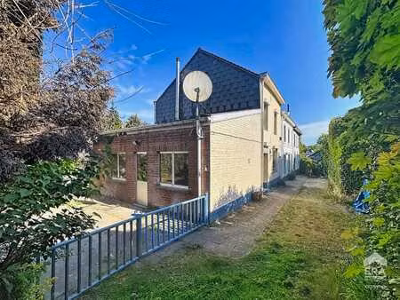 maison 3 façades avec jardin et garage