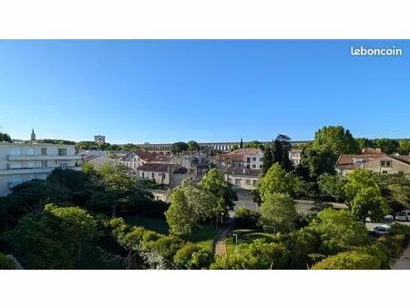 appartement arceaux 3 pièces 2 chambres parking  climatisation et vue