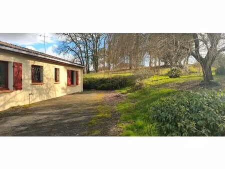maison individuelle récente avec garage et magnifique terrain arboré de 2000 m²