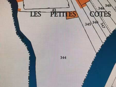 terrain constructible + bâtis anciens