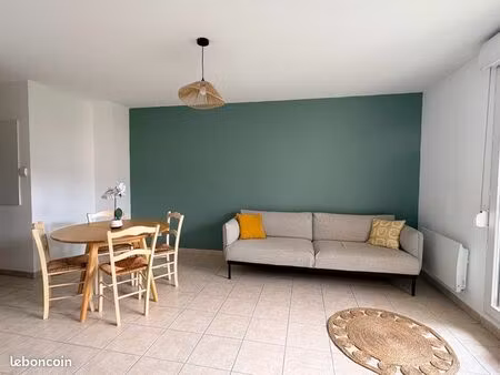 appartement 45m2 avec place de parking en résidence sécurisée