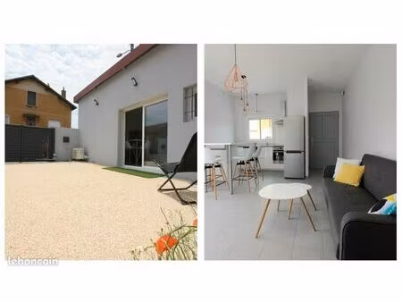 petite maison avec jardinet et place de parking