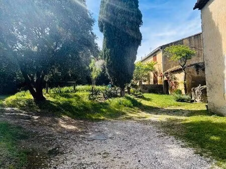 terrain constructible 1800 m² avec maison à rénover