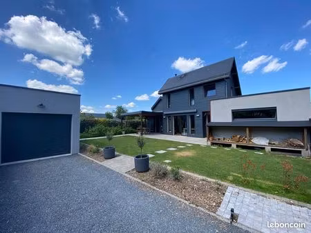 maison contemporaine avec jardin  terrasse  pergola et garage à montigny 76380
