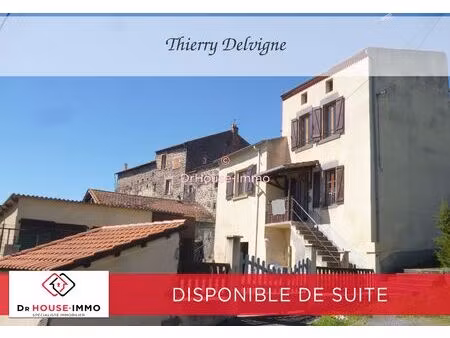 maison 4 pièces   caves   double garage   cour .