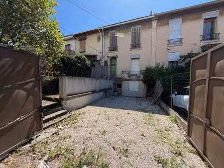 immeuble de rapport avec jardin et parkings