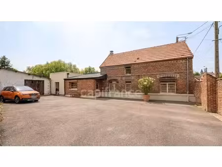 maison individuelle semi plain-pied - 117 m² - 3 chambres + bureau – cour – garage - dépen