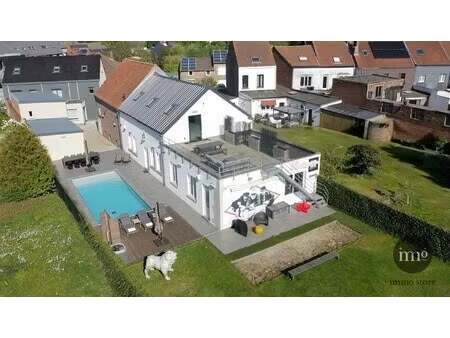 multifunctioneel volledig gerenoveerd gebouw met bijgebouw  7 slaapkamers  appartement  tu