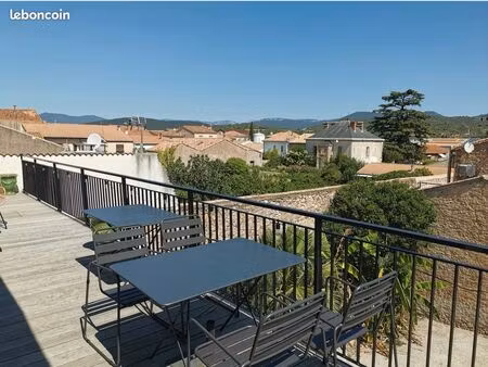 maison divisée en 4 appartements