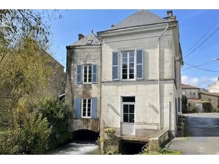 ancien moulin à eau avec potentiel de développement