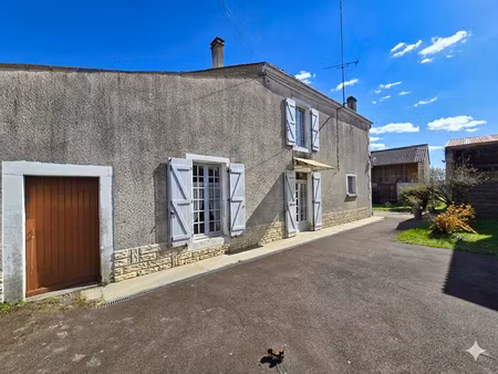 maison de 3 chambres avec garage et jardin