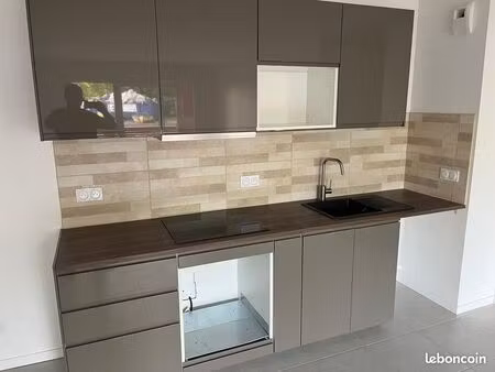 appartement t3 neuf avec balcon et garage dans quartier recherché à deux pas du centre his