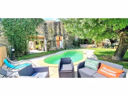 exceptionnel demeure avec piscine chauffée au cœur de puissalicon – idéal famille  investi