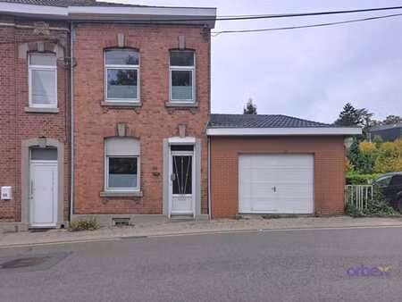 maison 3 chambres avec garage  atelier  caves et jardin.
