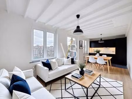 superbe penthouse remis à neuf 2 ch+bureau avec terrasse!