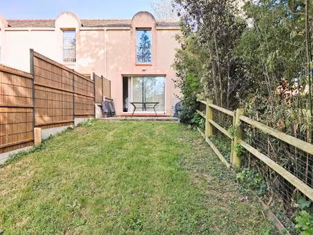 appartement t3 de 71 m2 avec jardin privatif et 2 places de stationnement