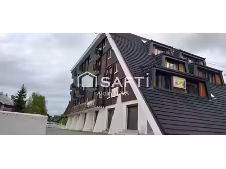 studio de 35m² avec casier à ski  local commun et parkin privé