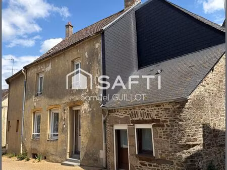 maison de ville en pierre avec grand garage